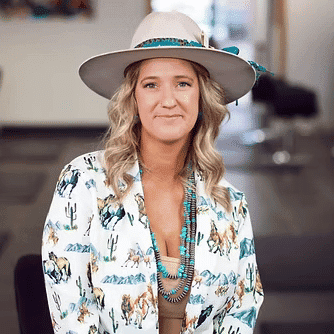 Portrait of Ashley Coronado, a professional stylist at Frequency Salon, showcasing their expertise and style.