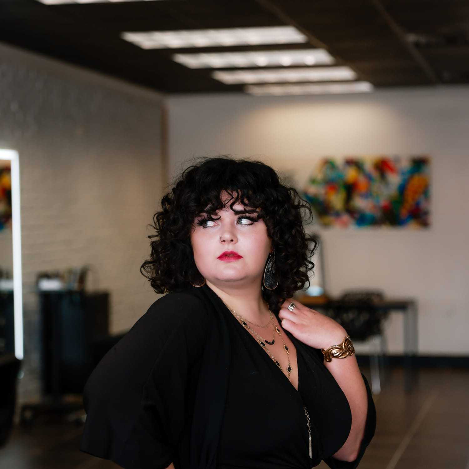 Portrait of Jessica Haughton, a professional stylist at Frequency Salon, showcasing their expertise and style.